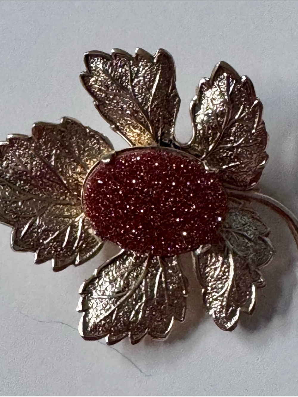 Gold Tone Leaf Brooch with Sparkling Rust Center